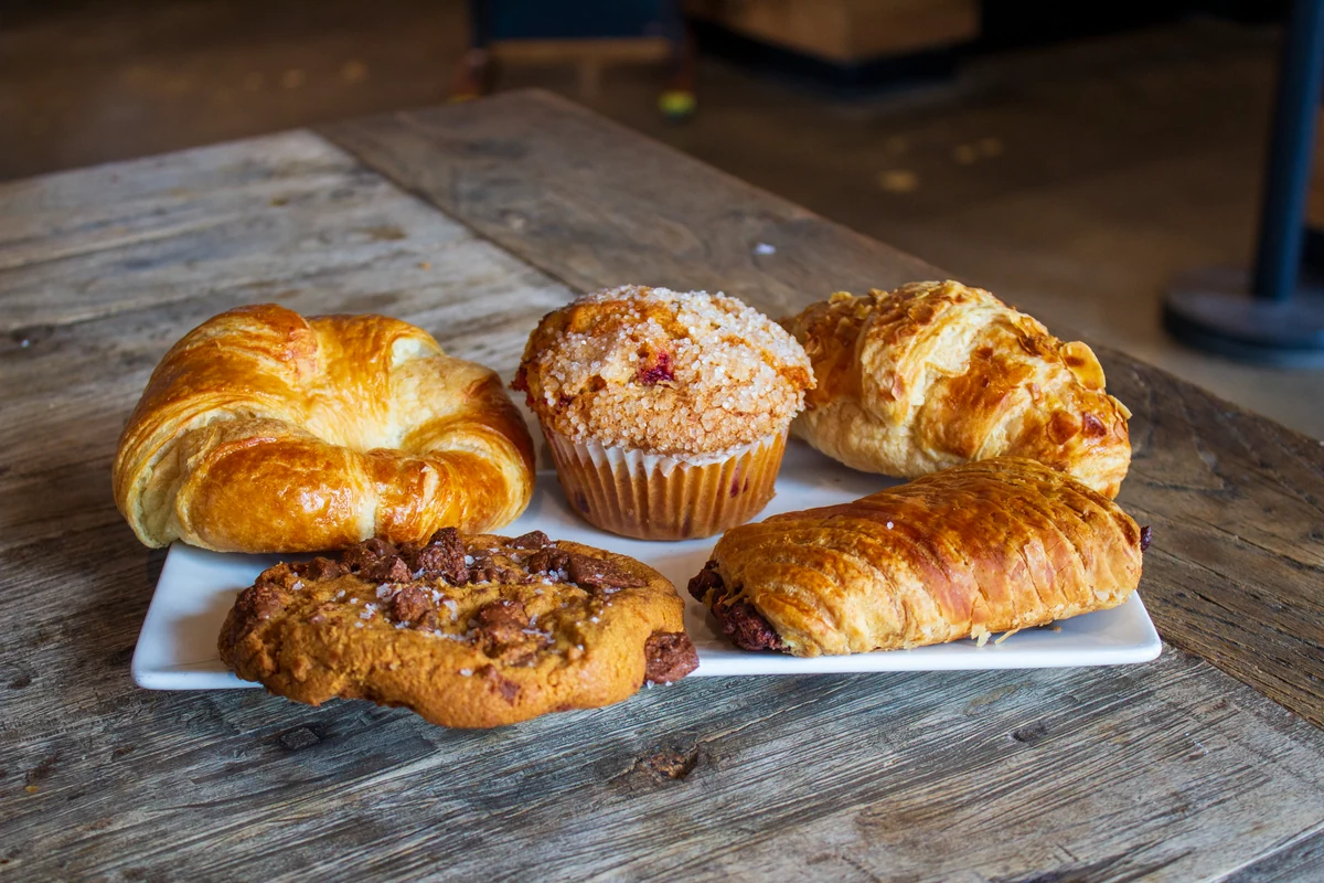 A selection of Fuel America pastries, a muffin, and a cookie.